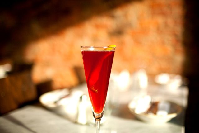 The GP Spritz: Aperol Hibiscus Infusion, lemon juice Hibiscus Tincture, topped with Prosecco.